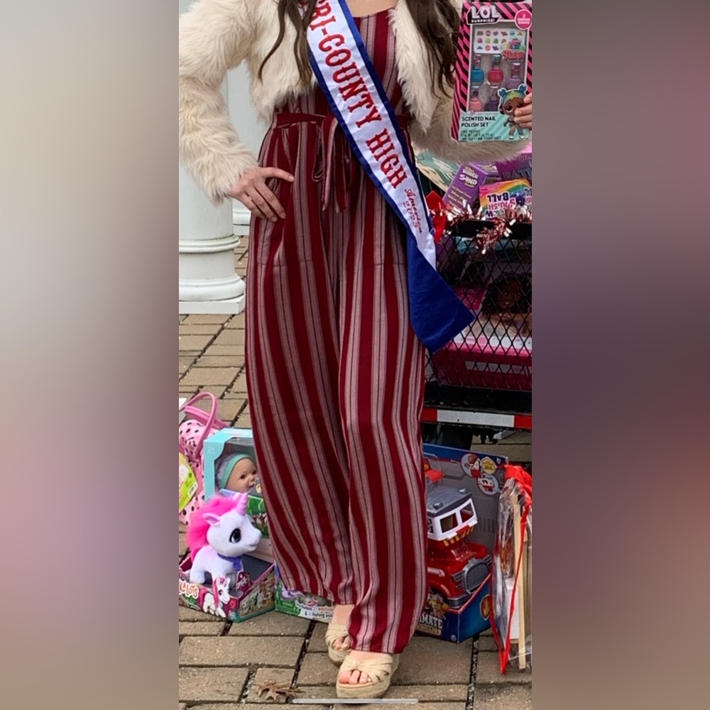 American Eagle red striped jumpsuit with tie.